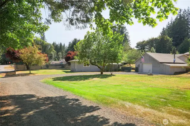 View from easement to home with detached garage with bonus additional 2 bedroom septic, power and water hook ups.