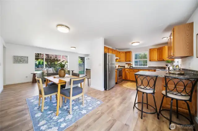 Upon entering you will enjoy this kitchen with all stainless aplliances and vinyl plank flooring along with granite counter tops and plentiful cabinetry.