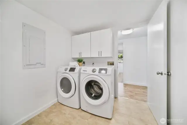 Main floor laundry is generous for additional shelving or storage.