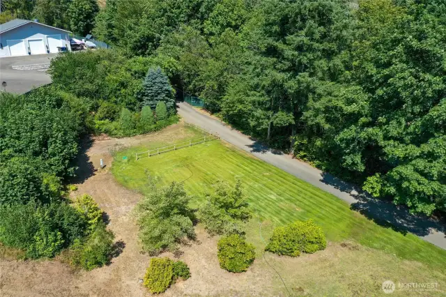 New grass area and fenced portion where drainfiled is for the additional 2 bedroom spetic, power and water. So many possibilities