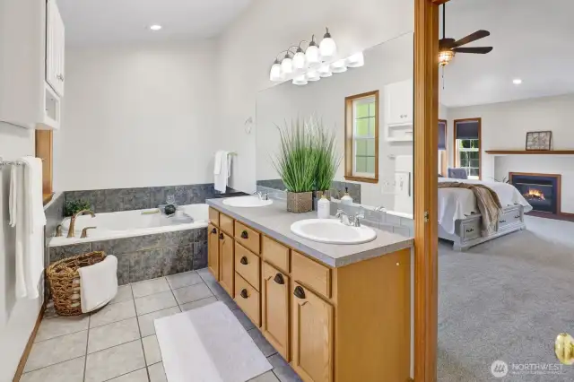 A great view of primary bath looking into the bedroom.