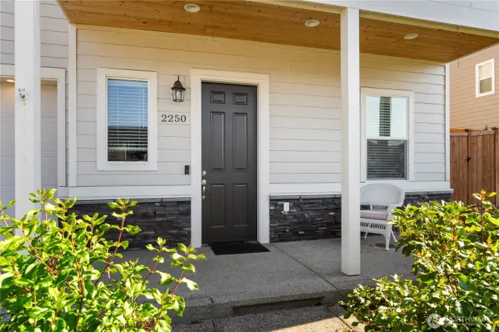Covered front porch entry.