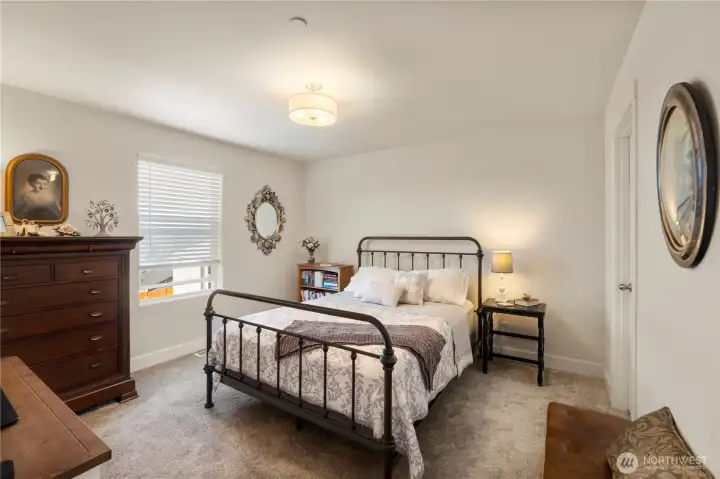 2nd bedroom on upper floor with walk in closet.