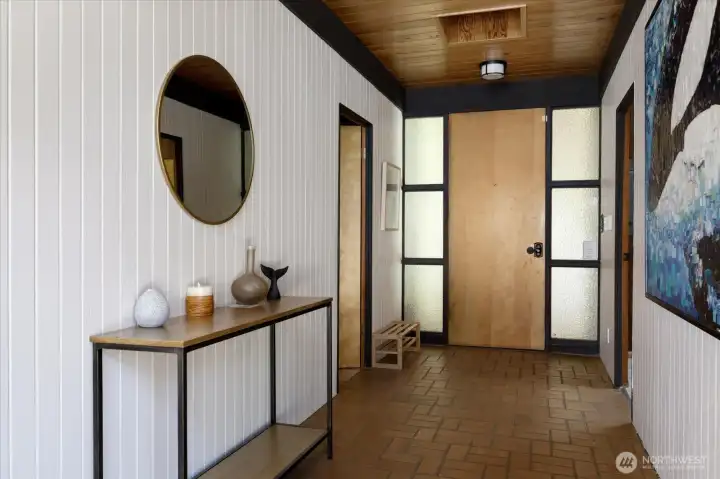 Foyer entering your home. Door to the right leads to two bedrooms with Jack and Jill bath. Door to the left leads to bunk room and laundry.