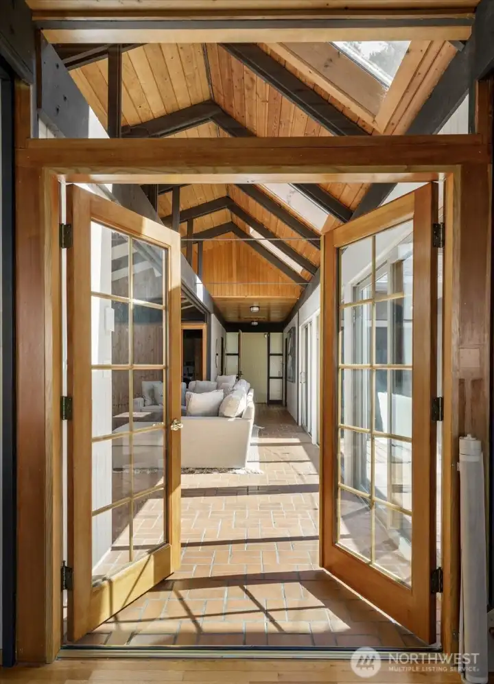 French doors looking back towards family room and front foyer.