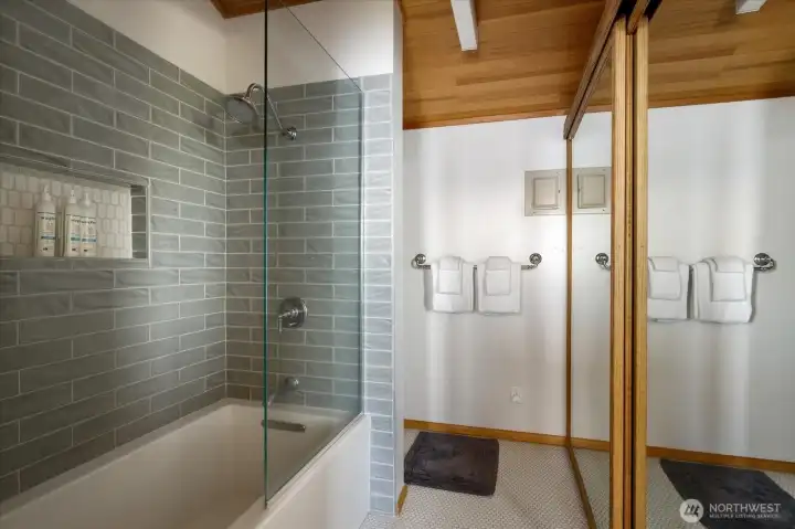 Primary bath with new tub and bath combination.