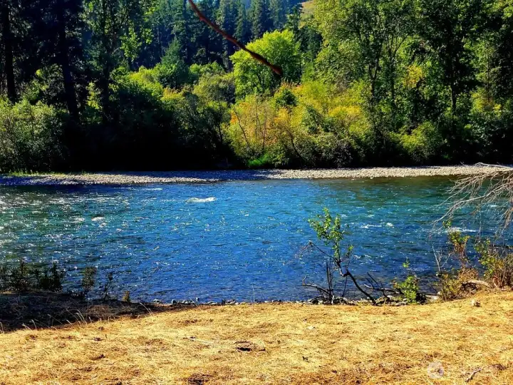 300 feet of river frontage with some extraordinary access and views on this lot