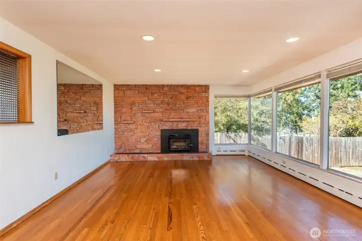 Main Level Living Room w/ wood burning stove.