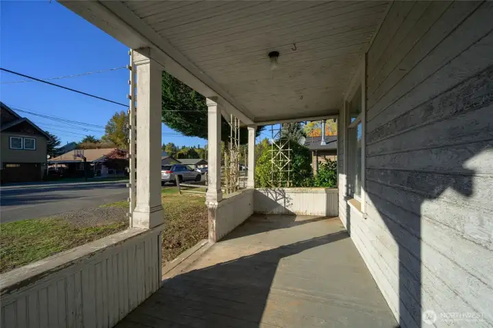 Westerly facing front porch is perfect for afternoon sun and evening drinks with friends.