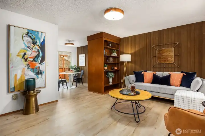 Built-in library shelving & warm wood paneling make this an inviting retreat.
