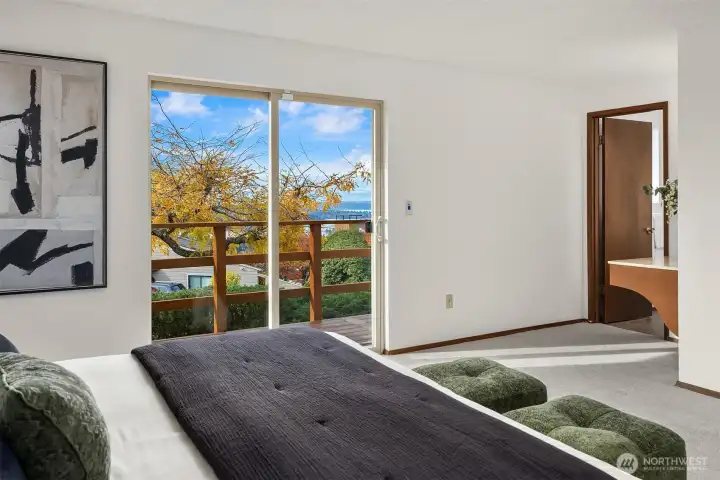 Sunset lake views, a built-in vanity, & en-suite bath, too!