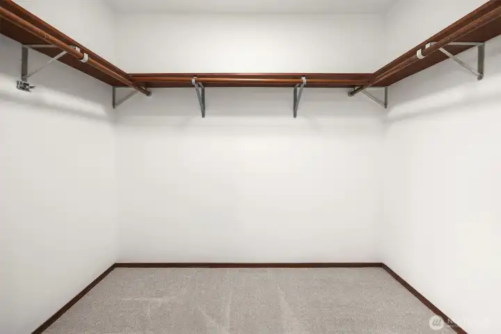 A generous walk-in closet can accommodate all of your favorite things.