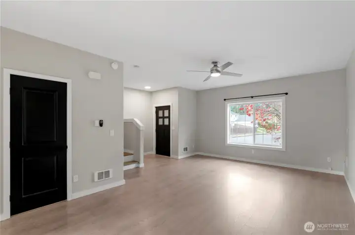 Living room with powder room access