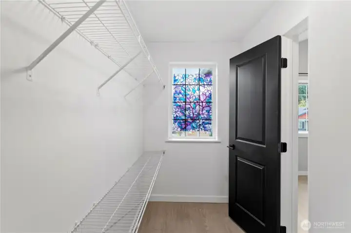 Primary bedroom large walk in closet