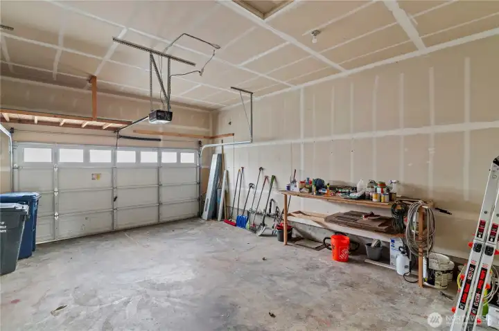 Spacious 2 car garage features expanded ceiling height for extra storage