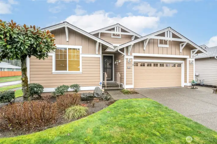 Fantastic curb appeal on a corner lot just across the street from the club house.