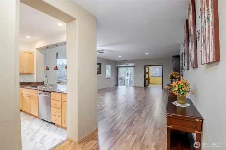 Welcome! The entry to this home is so inviting with beautiful floors a breakfast bar, dining space, living space and easy access to the private back yard.