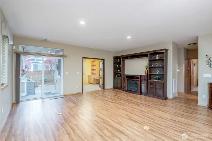 The built-in entertainment center with an electric fireplace is beautiful!