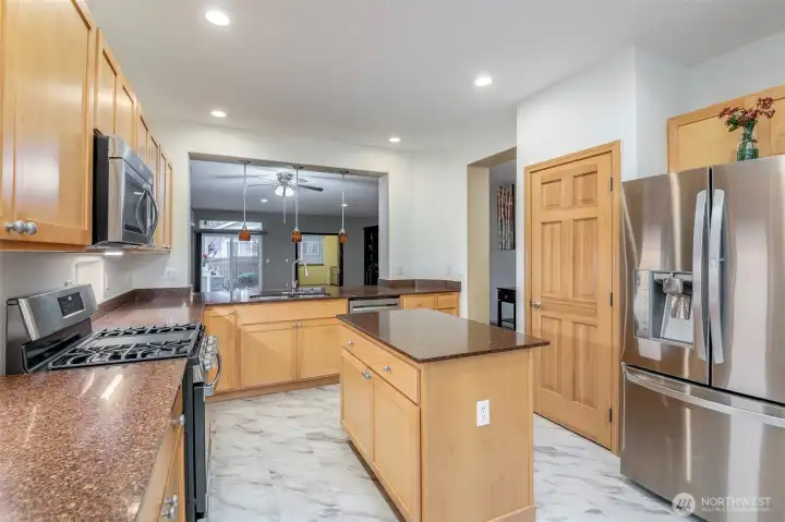 The view from the kitchen dinette space looking back into the great room is stunning. The appliances are new and the counters, cabinets and work space are more than ample.