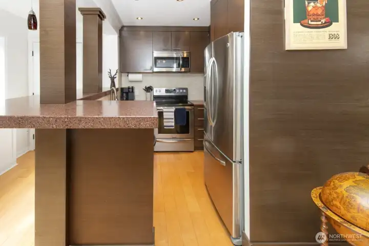 Kitchen with stainless steel appliances and beautiful cabinets with so much storage.