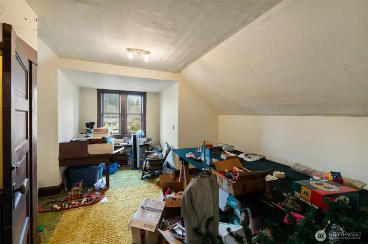 Upstairs find two additional bedrooms.