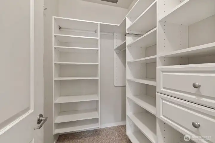 Primary bedroom offers walk in closet and storage galore