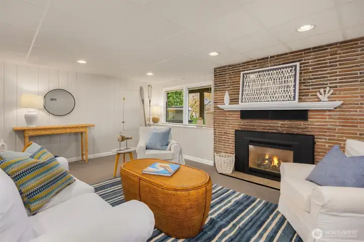 Day-light lower level flex space with fireplace