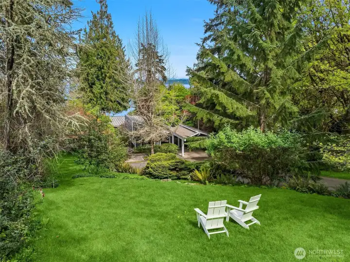 Expansive 1.27 acre lot with plenty of spaces to enjoy
