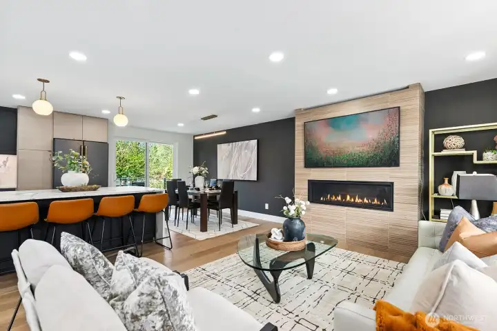 Great room with gas fireplace with floor to ceiling tile