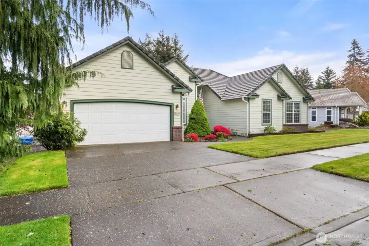 Sprinklered and landscaped with charming curb appeal.  Spacious 2 car garage with pebble coated floor.  Tile roof plus solar provides energy savings!