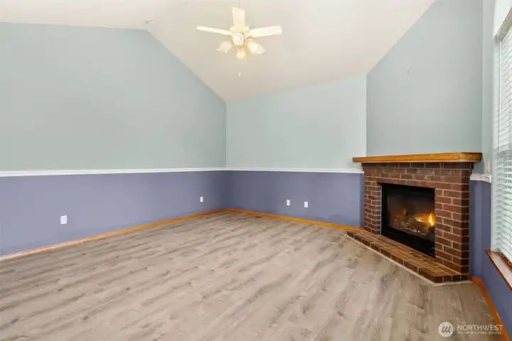 Natural gas fireplace offers a warm cozy atmosphere at the flip of a switch!