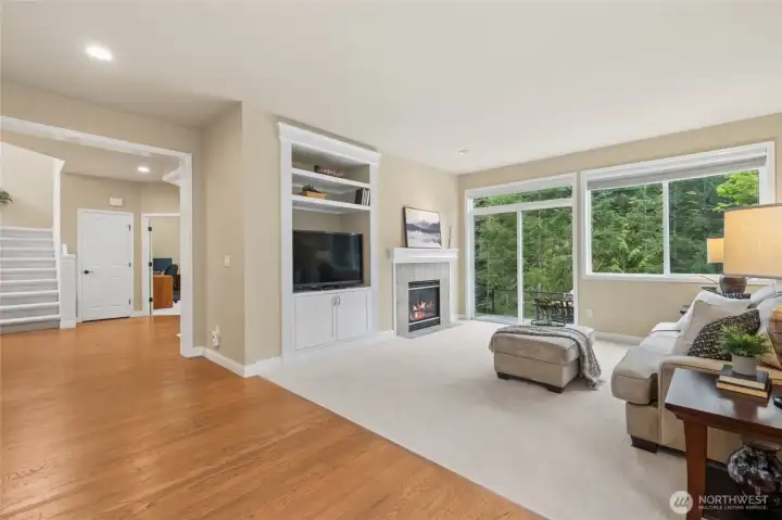 Family room with wood burning fireplace