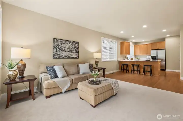 Family room is open to the kitchen and next to the dining room.   The ideal layout for entertaining.