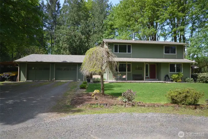 Detached two car garage plus carport
