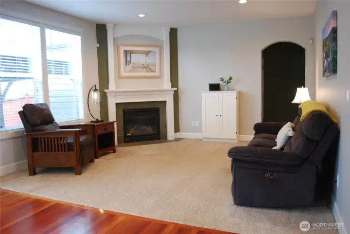 Inside, the attention to detail is immediate: 9ft coffered ceilings, a family room with gas fireplace, access to three car tandem garage and luxury utility room.