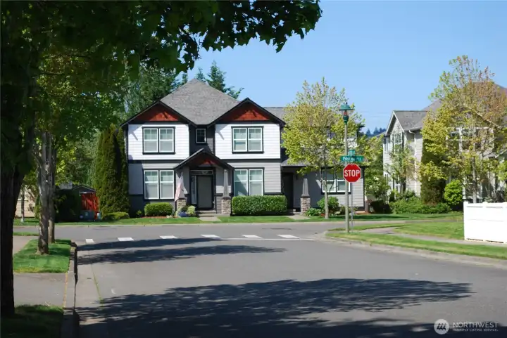 Stunning 2,539 sqft, 4 bedroom, 3 full baths, 3 car tandem garage, Canterwood home with discrete – side of home RV parking, AC, fully fenced backyard, alley access, and craftsman mill work throughout.