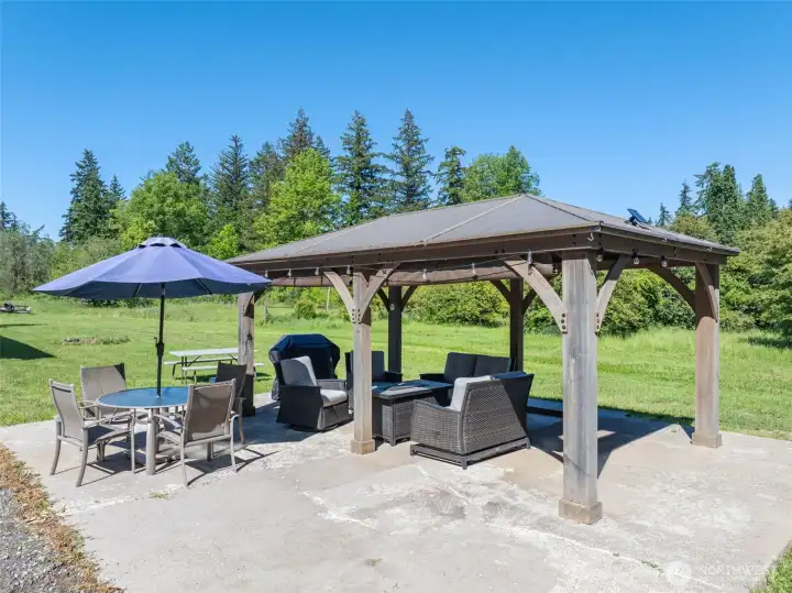 Patio with gazebo covering. Furniture can stay.