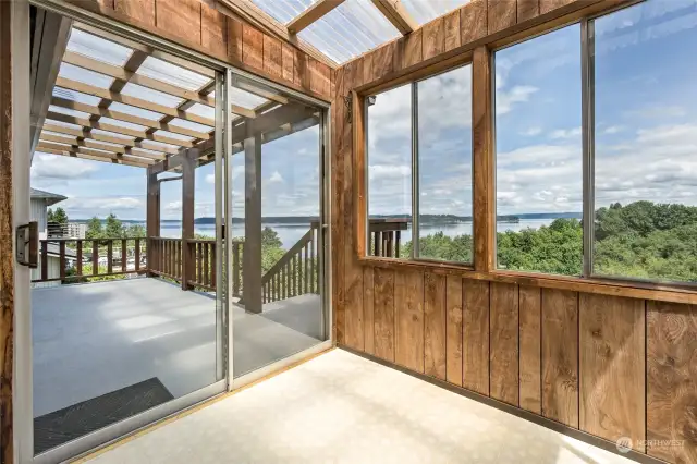 Covered Poarch and enclosed sunroom