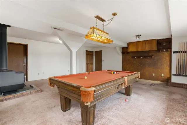 Second living room with pool table.
