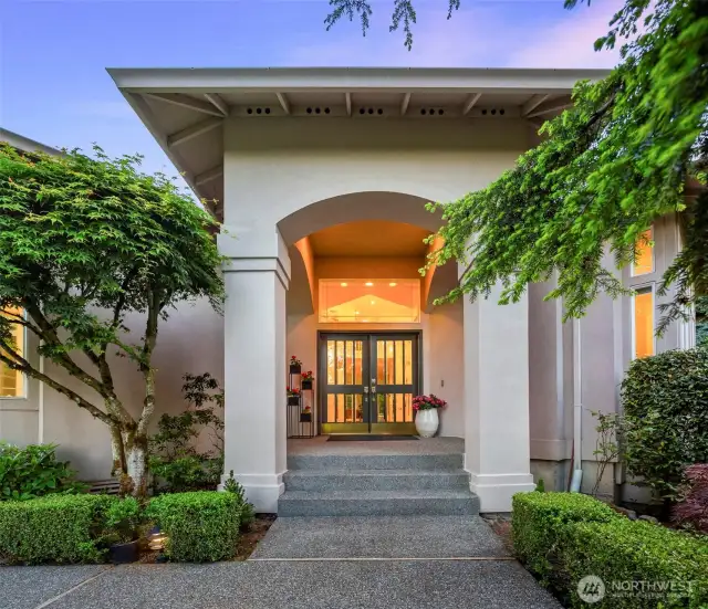 A grand entrance welcomes you with soaring ceilings, elegant finishes, and an abundance of natural light.