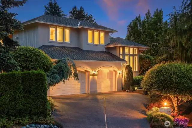 This elegant custom home offers refined living with spacious interiors, stunning views, and exceptional indoor-outdoor spaces designed for comfort and entertaining.