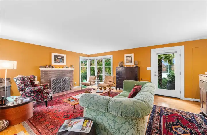 Hardwoods, stair step molding, plentiful windows and wood-burning fireplace