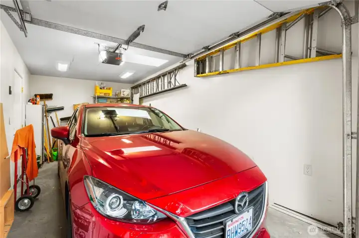 One car alley garage with skylight