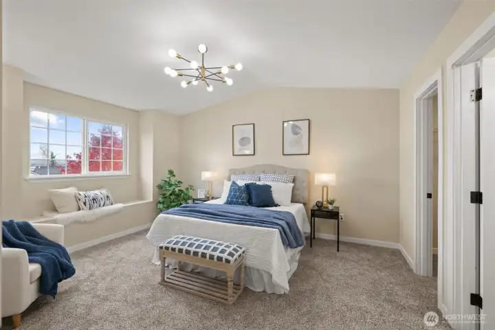 Large Primary Suite with peaceful window seating.
