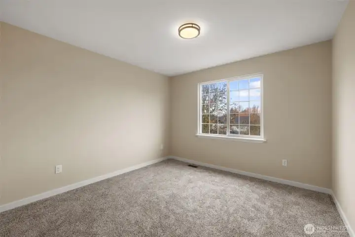 West Facing Bedroom with peekaboo views.