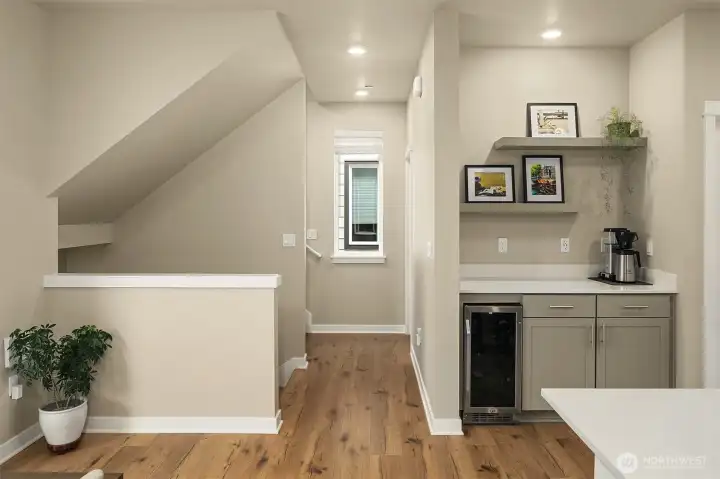 Bar area with wine fridge.