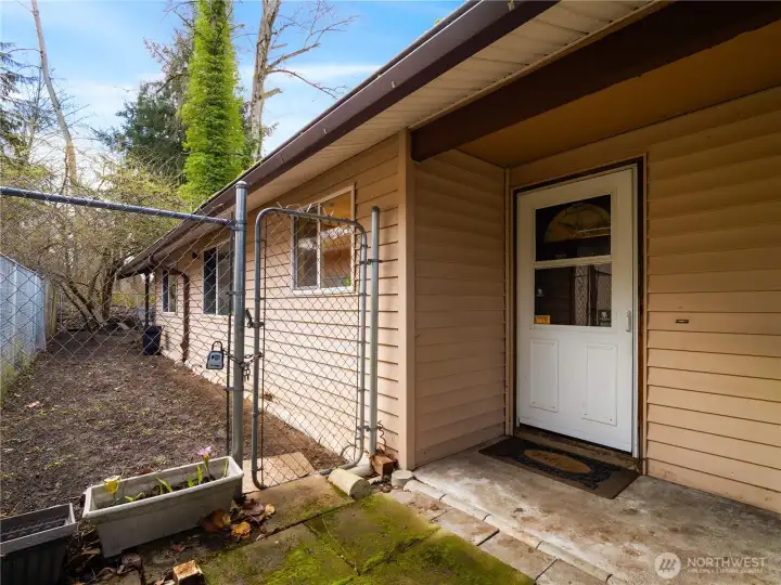 Fully fenced back yard. If you have furry friends; this is a perfect place for them.