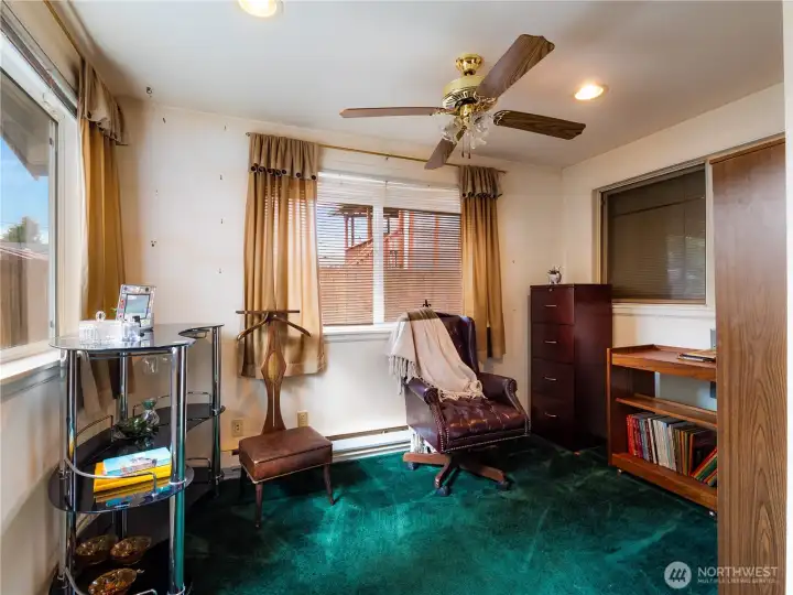 The end of the family room could be walled off and made into an office.