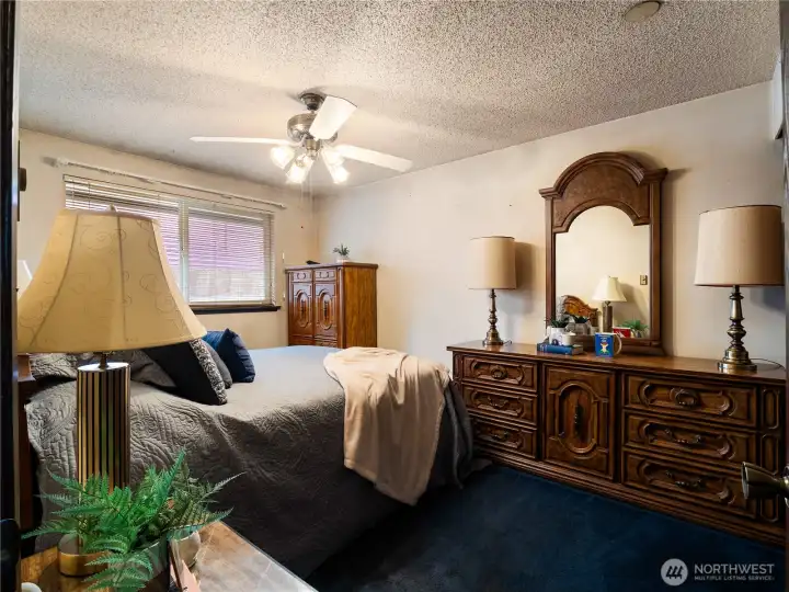 The primary bedroom is large and have room for a full bedroom set.