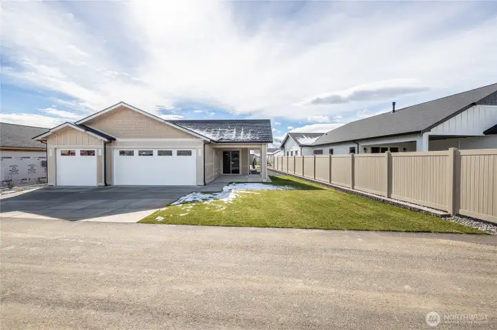Back yard with rear 3 car garage